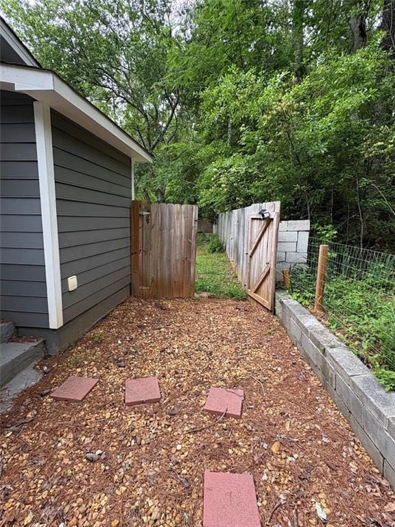 38 Daniel Cir, Franklin, GA 30217 - view of yard with a gate