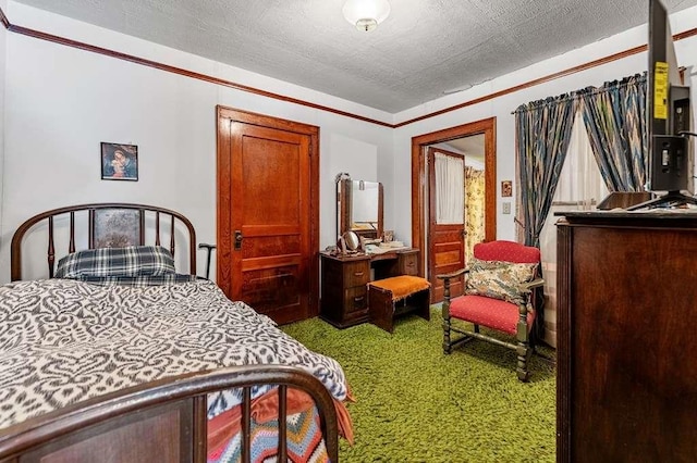 carpeted bedroom featuring a textured ceiling