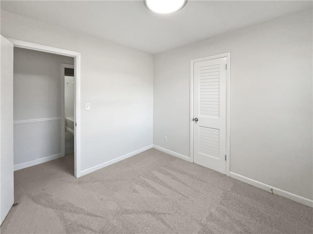 unfurnished bedroom with carpet