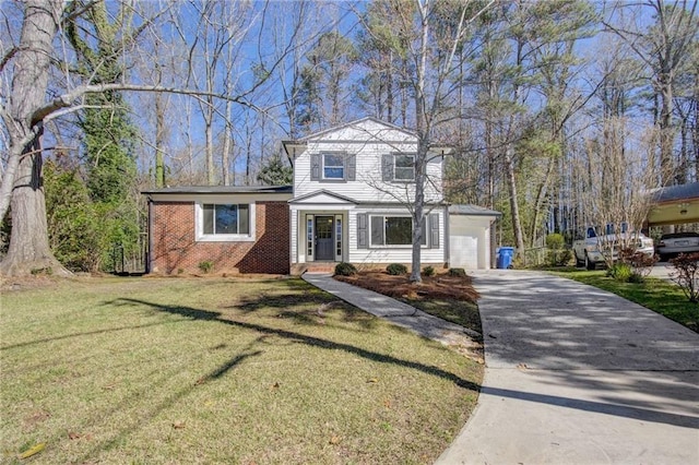 view of front of property featuring a front lawn, driveway, a garage, and brick siding