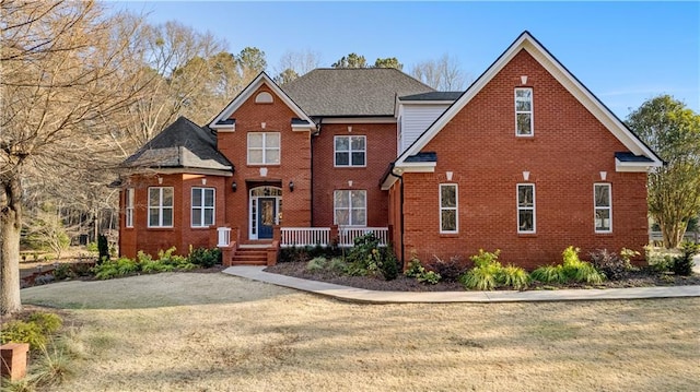 view of front of property with brick siding