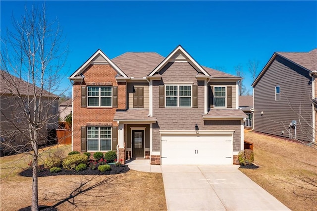 view of front of home featuring a garage and a front lawn