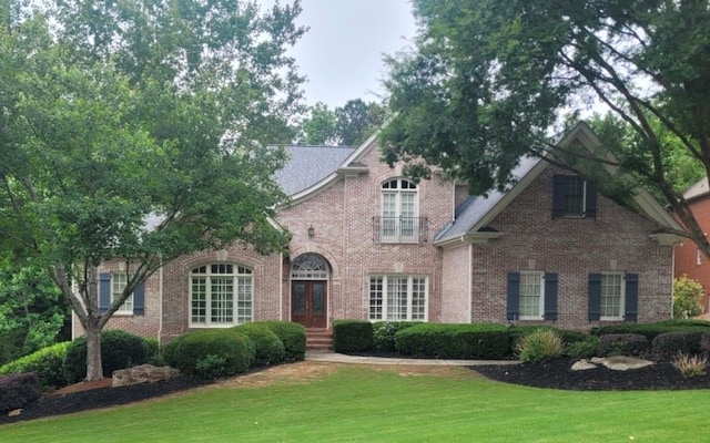 415 Winn Park Ct, Roswell, GA 30075 - view of front of home with french doors, a front lawn, and brick siding
