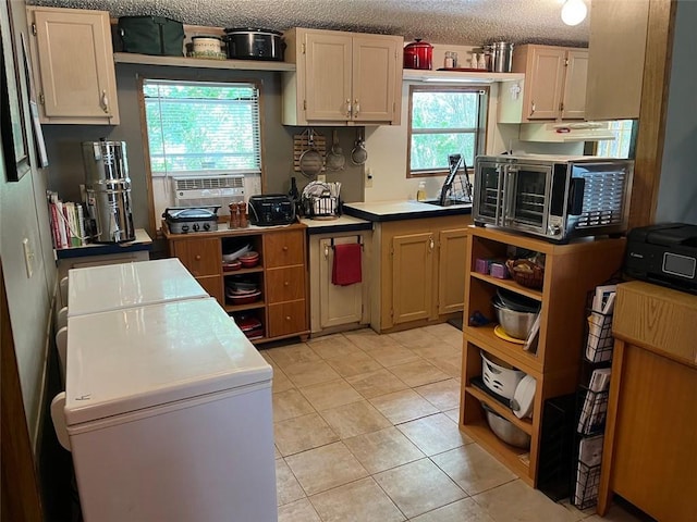 kitchen with light tile patterned floors, separate washer and dryer, open shelves, and refrigerator