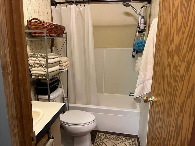 full bath featuring tile patterned floors, vanity, toilet, and shower / tub combo with curtain