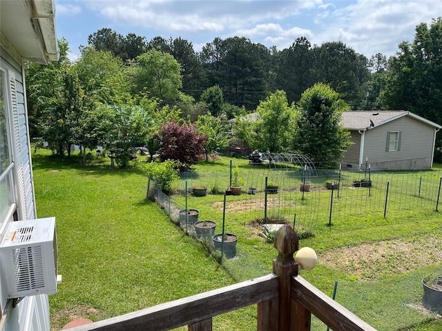 view of yard with fence and cooling unit