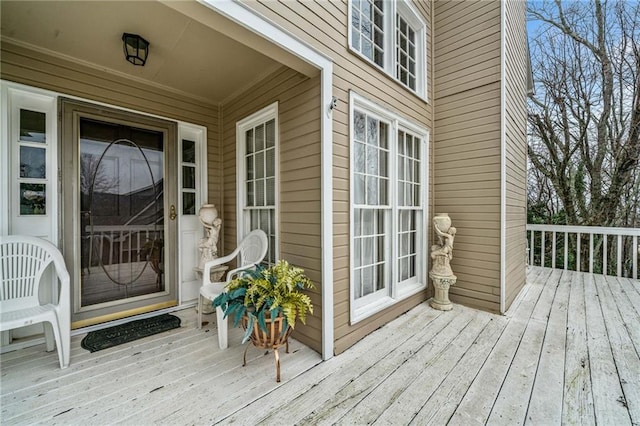 doorway to property with a wooden deck