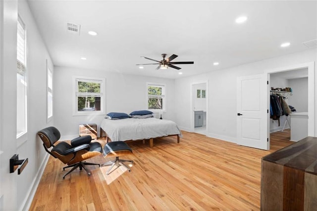 bedroom featuring recessed lighting, baseboards, and light wood finished floors