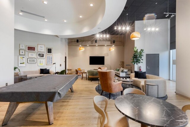 1080 Peachtree St NE Unit 608, Atlanta, GA 30309 - playroom with billiards, light wood finished floors, a high ceiling, and recessed lighting