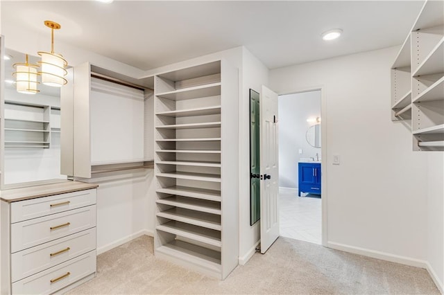 51 River Overlook Ct, Dawsonville, GA 30534 - walk in closet featuring light colored carpet and a sink