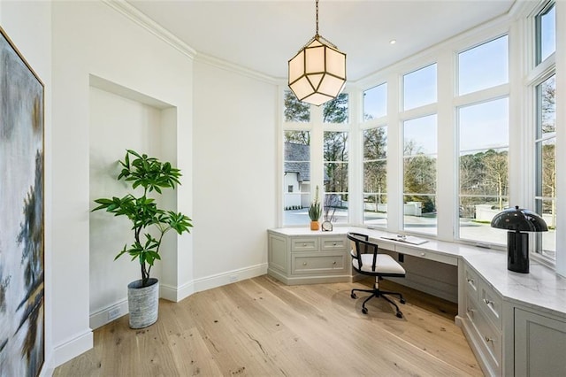 office area featuring light hardwood / wood-style floors and ornamental molding