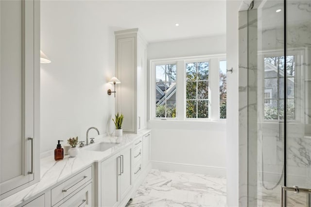 bathroom with vanity and walk in shower