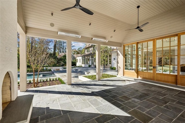 view of patio / terrace with ceiling fan and french doors