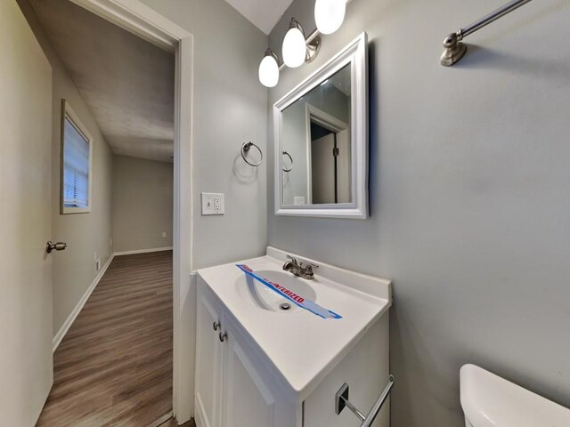 unfurnished bedroom featuring light hardwood / wood-style flooring and a textured ceiling