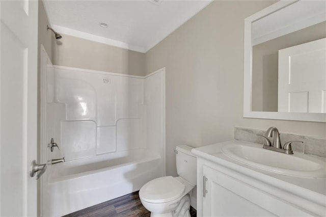 full bathroom featuring wood-type flooring, vanity, toilet, and shower / bathtub combination