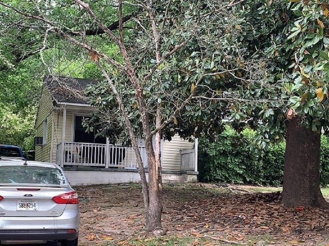 view of home's exterior with covered porch