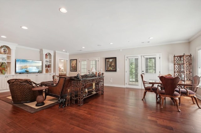 interior space featuring french doors, dark wood-type flooring, and crown molding