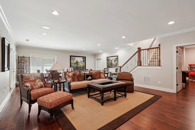 living room featuring crown molding and hardwood / wood-style flooring