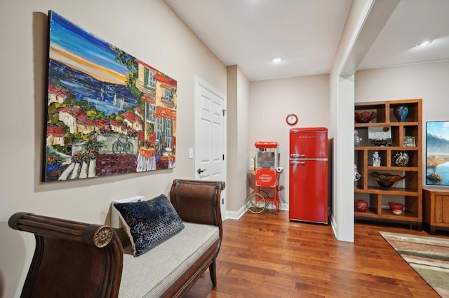 living area with wood-type flooring