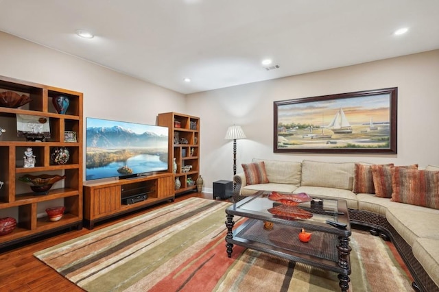 living room with hardwood / wood-style flooring