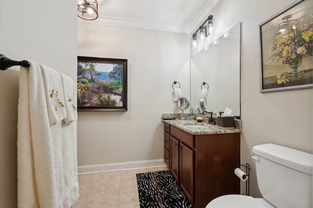 bathroom with toilet, crown molding, vanity, and tile patterned flooring