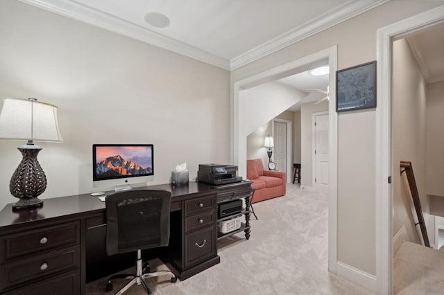 office space with light carpet and ornamental molding