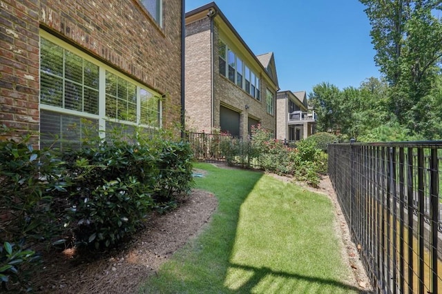 view of yard featuring a garage