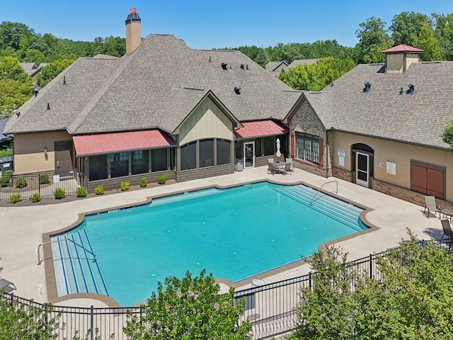 view of swimming pool featuring a patio