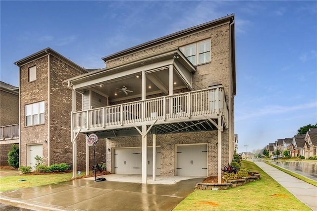 4831 Miller Hill Rd, Buford, GA 30518 - view of front of home featuring brick siding, driveway, a ceiling fan, a garage, and a balcony