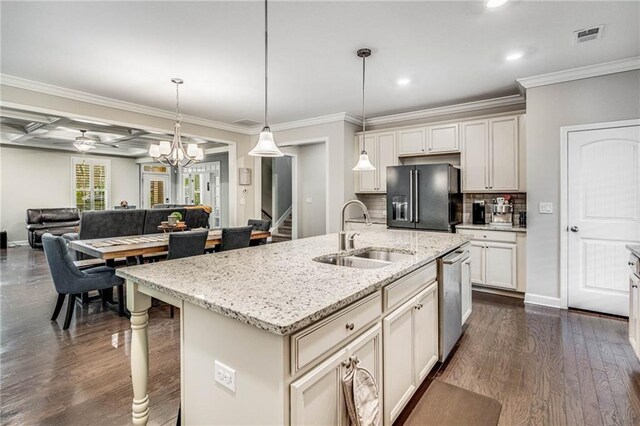 4831 Miller Hill Rd, Buford, GA 30518 - kitchen featuring black fridge, a sink, dishwasher, a kitchen breakfast bar, and recessed lighting