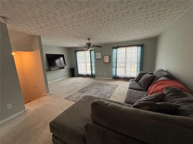 6231 Redan Overlook, Lithonia, GA 30058 - living area featuring light carpet, a ceiling fan, and baseboards