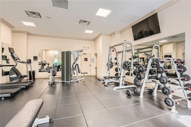 gym featuring crown molding and visible vents