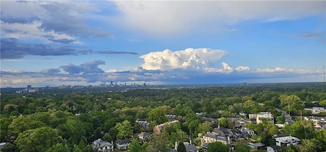 drone / aerial view featuring a forest view