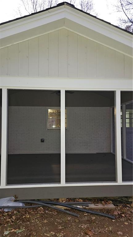 1080 Laboon Rd, Monroe, GA 30655 - view of property exterior featuring a sunroom