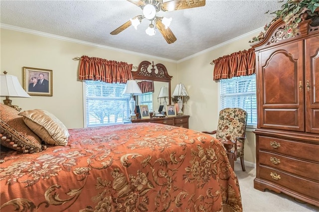 bedroom with a textured ceiling, light carpet, and multiple windows