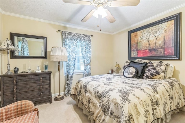 carpeted bedroom with a ceiling fan, baseboards, ornamental molding, and a textured ceiling