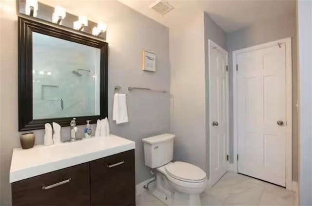 full bath with a shower, visible vents, vanity, and toilet