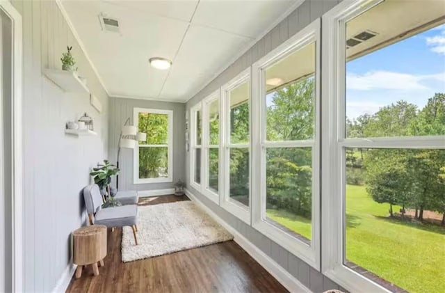 sunroom / solarium with visible vents