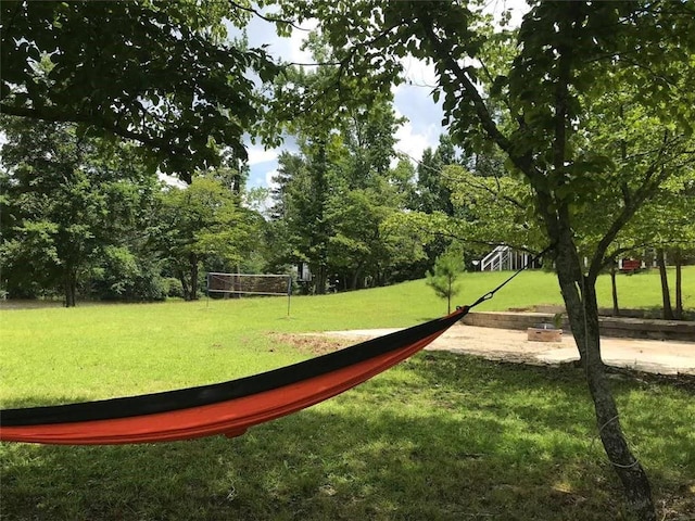 surrounding community featuring a lawn