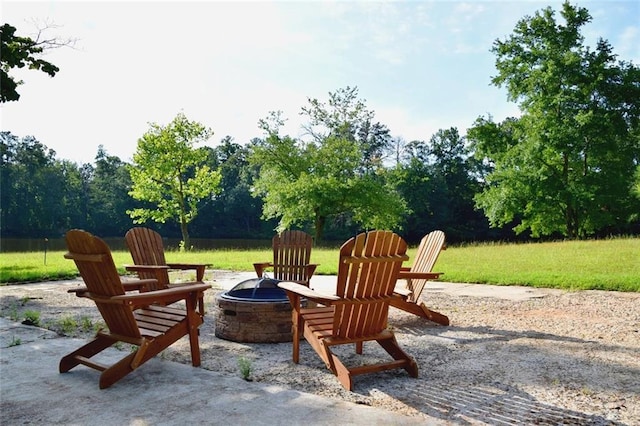 view of patio / terrace with a fire pit