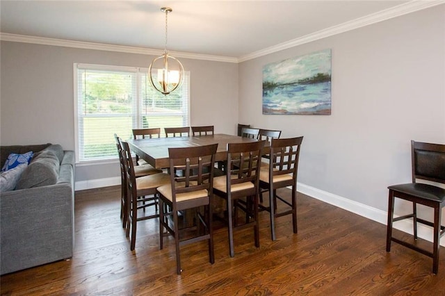 dining room featuring crown molding, baseboards, and dark wood-type flooring