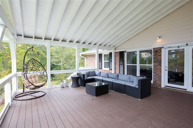 wooden terrace with outdoor lounge area