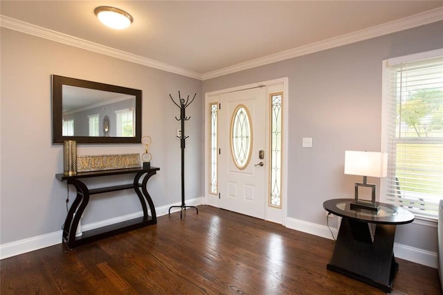 entrance foyer with plenty of natural light, crown molding, baseboards, and wood finished floors