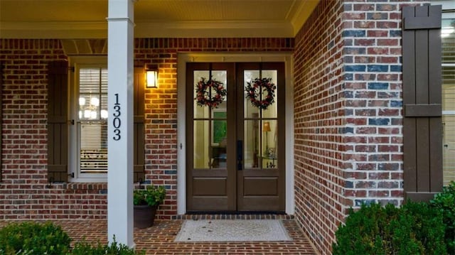 doorway to property featuring french doors