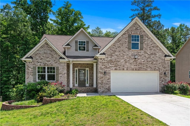 350 Paces Dr, Lithia Springs, GA 30122 - craftsman-style home with concrete driveway, brick siding, a front yard, and a garage