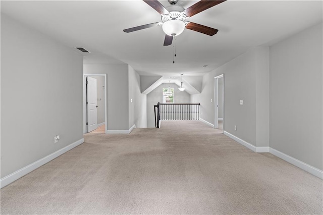 350 Paces Dr, Lithia Springs, GA 30122 - empty room with light colored carpet, ceiling fan, and baseboards