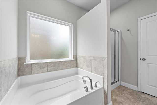 350 Paces Dr, Lithia Springs, GA 30122 - full bath featuring a garden tub and a shower stall