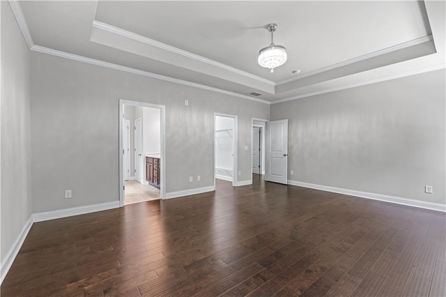 350 Paces Dr, Lithia Springs, GA 30122 - empty room featuring a tray ceiling, hardwood / wood-style floors, crown molding, and baseboards