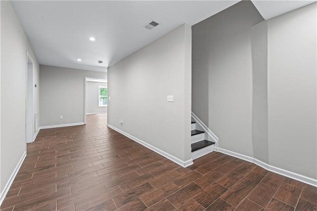 350 Paces Dr, Lithia Springs, GA 30122 - spare room featuring wood finish floors, recessed lighting, baseboards, and stairway