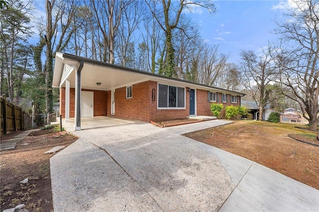 ranch-style home with a carport